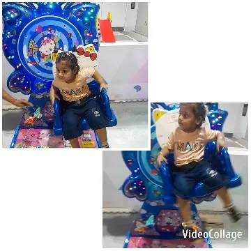 Child on Cartoon Amusement Ride