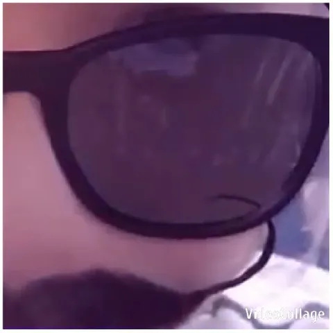 Close-Up of Sunglasses and Beard