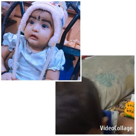 Baby with Hat and Toys Indoors