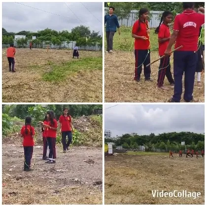 Children in Red Shirts Playing Outdoors