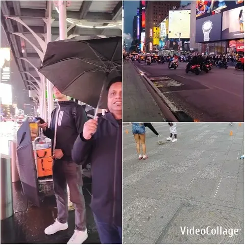 Umbrella Protects Two From City Scene