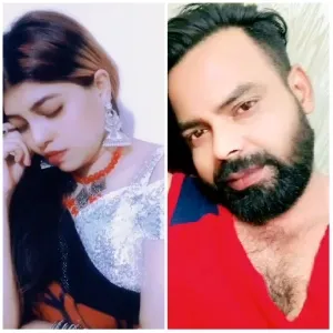 Two People Posing for the Camera