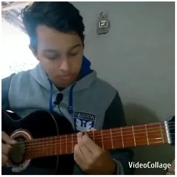 Acoustic Guitar Performance in Hoodie