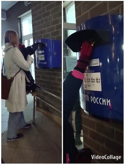 Child Reaching Blue Mailbox
