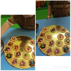 Child Reaching for Colorful Cookies