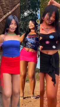 Three Women in Colorful Outfits
