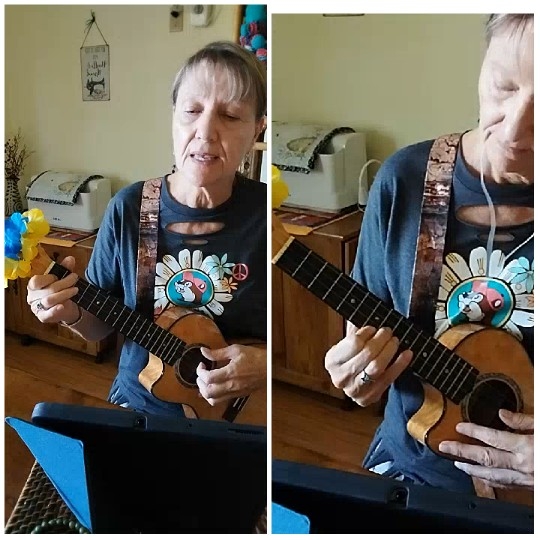 Person Playing Ukulele Indoors