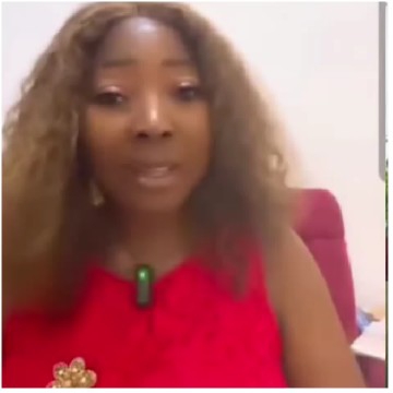 Woman in Red Dress Speaking