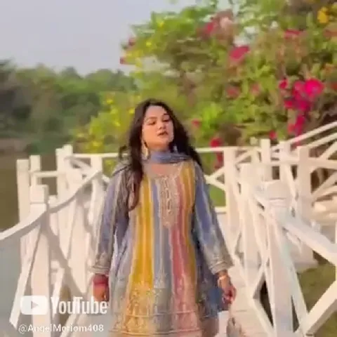 Colorful Dress on Scenic Bridge