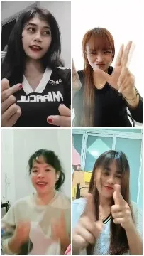 Four Smiling Women Indoors