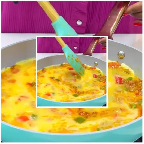 Stirring Omelet in Turquoise Pan