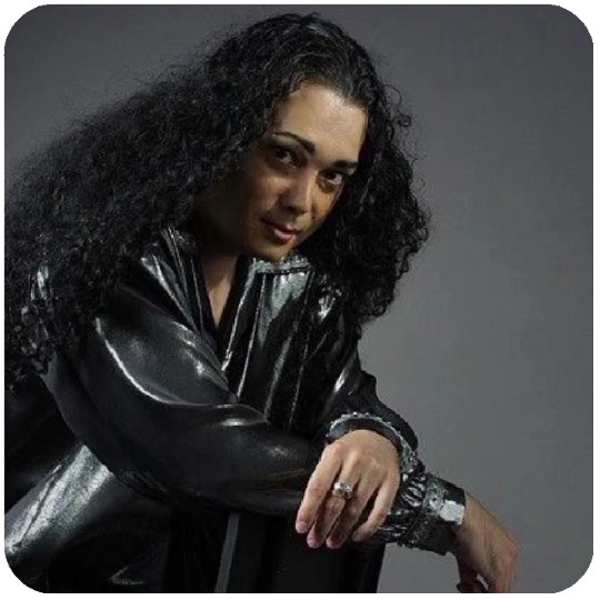 Person Posing in Metallic Jacket