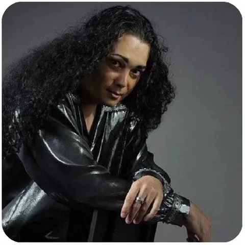 Person Posing in Metallic Jacket