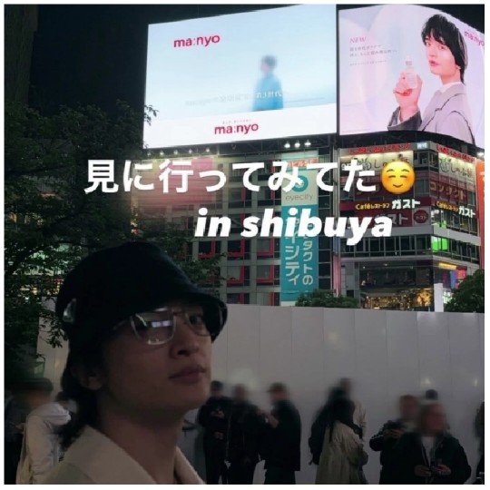 Person in Shibuya with Advertisements