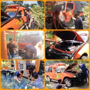 Maintenance Work on Orange Vehicle