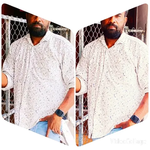 Man with Beard by Chain-Link Fence