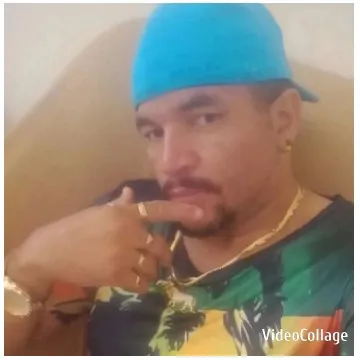Person Posing with Finger to Lips