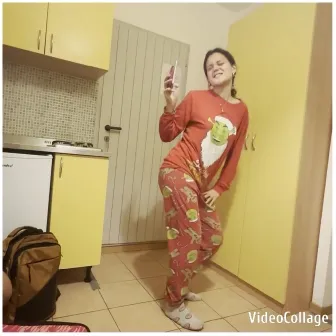 Smiling in Pajamas in Kitchen