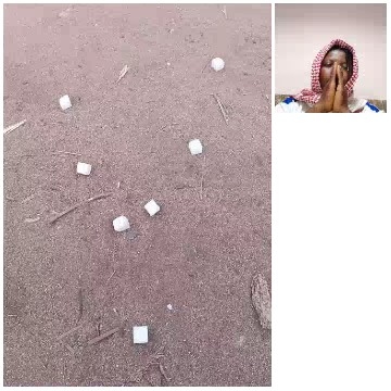 Person with Hands on Mouth in Sand