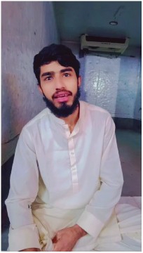 Man in Traditional Clothing Indoors