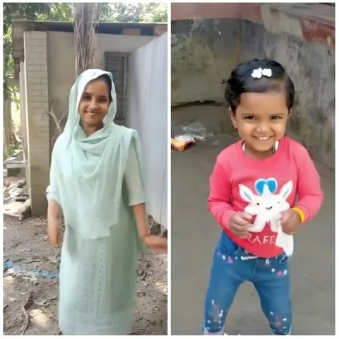 Woman in Traditional Outfit and Child