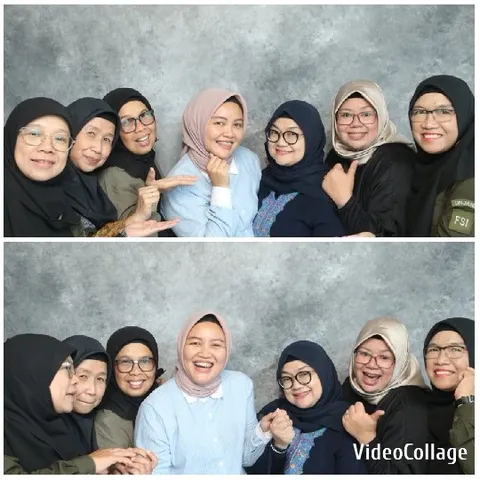 Women Smiling Together in Neutral Setting