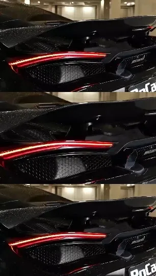 Luxury Car Rear with Glowing Tail Lights