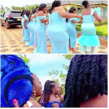 Women in Blue Dresses and Braided Hair