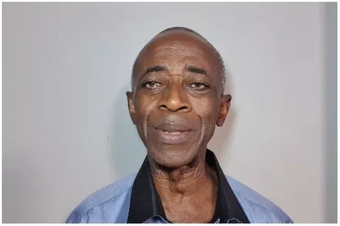 Older Man in Blue Shirt