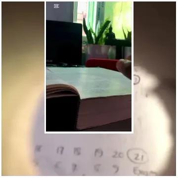 Desk with Book and Computer