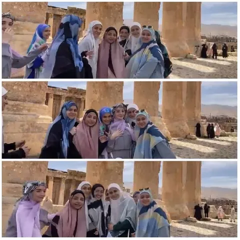Women Smiling at Ancient Ruins