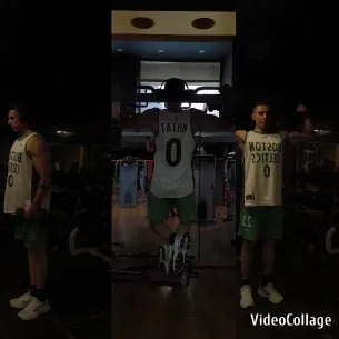 Individual Performing Pull-Up in Gym