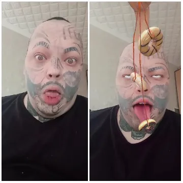 Tattooed Person with Open Mouth