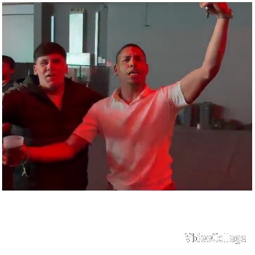 Men Dancing with Drinks Together