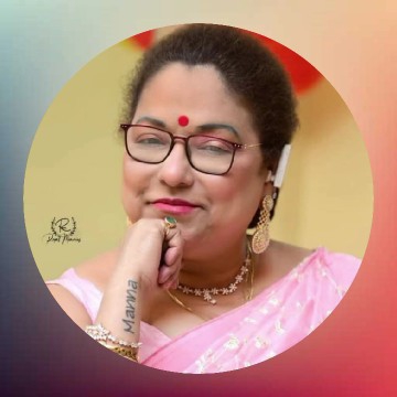 Woman in Pink Saree and Glasses