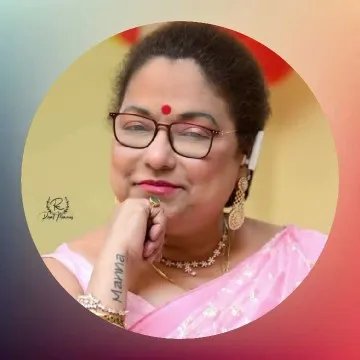 Woman in Pink Saree and Glasses