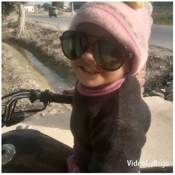 Child on Motorcycle in Sunny Day