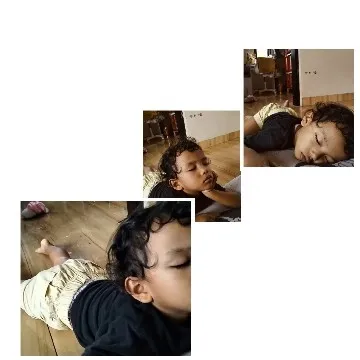 Child Asleep on Wooden Floor