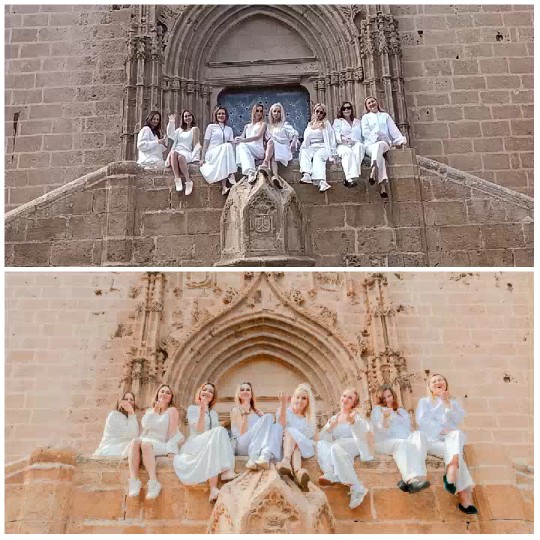 People in White at Historic Facade