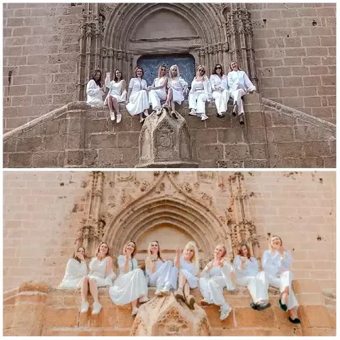People in White at Historic Facade
