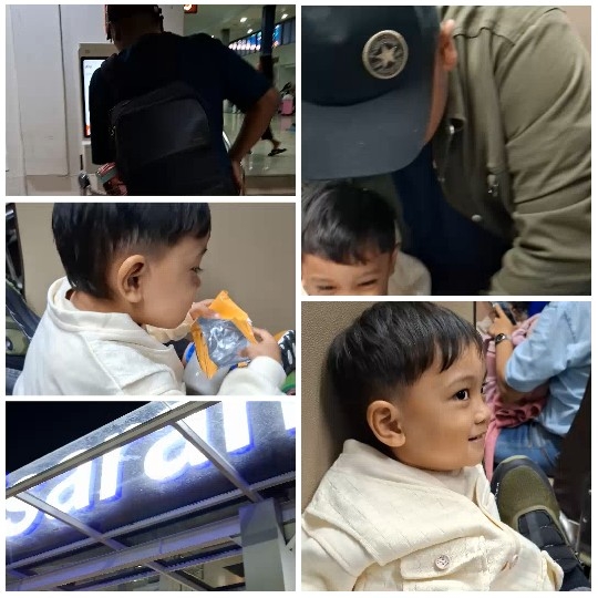 Man with Backpack and Smiling Child