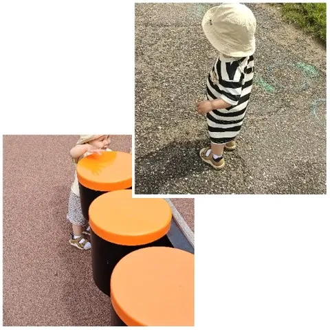 Child on Playground with Chalk Drawings