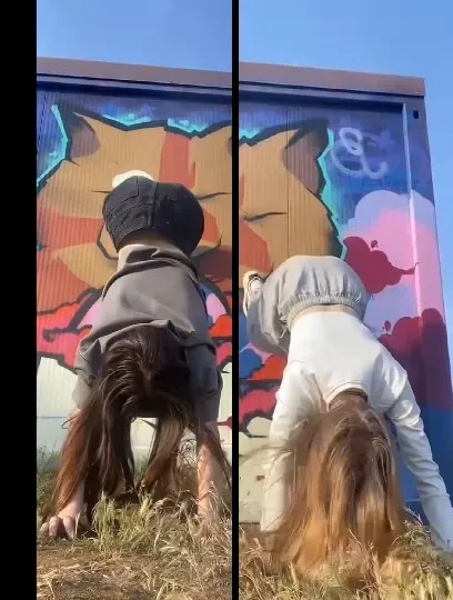 Handstands Against Colorful Graffiti
