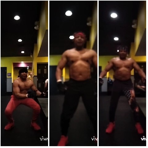 Muscular Man Posing at the Gym
