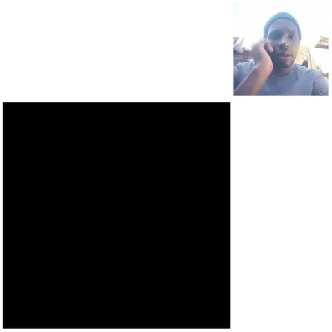 Man Talking on Phone Outdoors