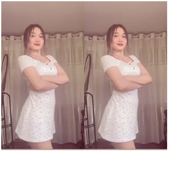 Mirrored Young Woman in Dress