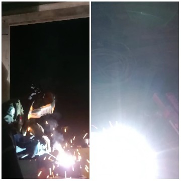 Welder Using Torch with Sparks Flying