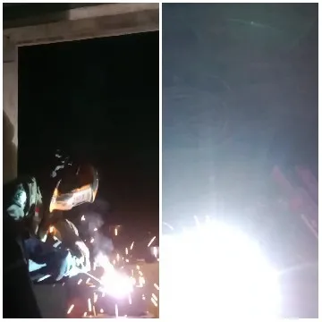 Welder Using Torch with Sparks Flying