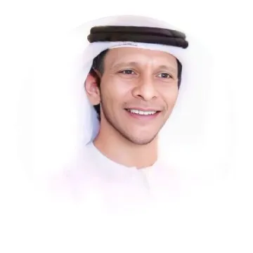 Man in Traditional Clothing Smiling