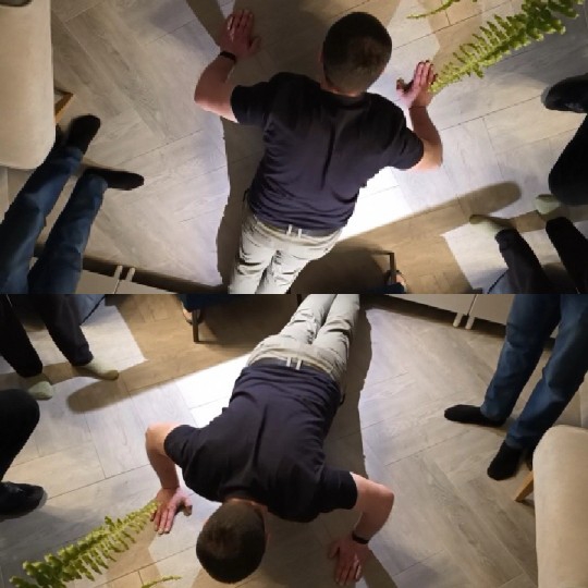 Push-Ups Surrounded by Feet